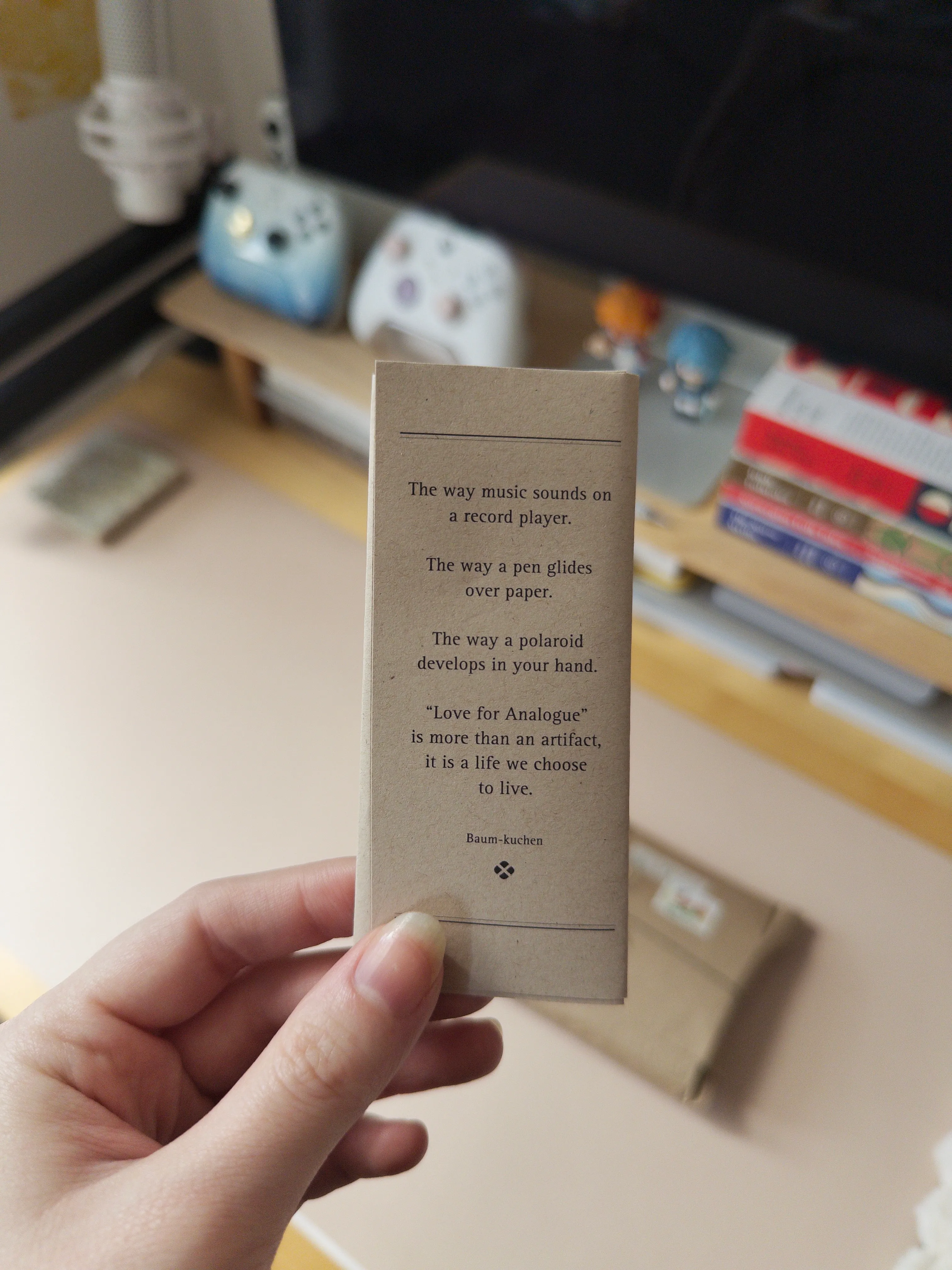 A note from the Baum-kuchen package that says "The way music sounds on a record player. The way a pen glides over paper. The way a polaroid develops in your hand. Love for Analogue is more than an artifact, it is a life we choose to live."
